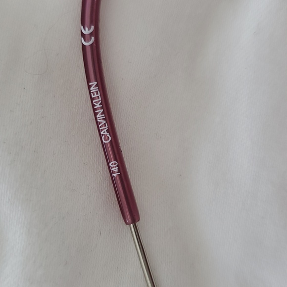 Calvin KLIEN Aviator Sunglasses with Silver Frame and Purple Lenses - Picture 4 of 8